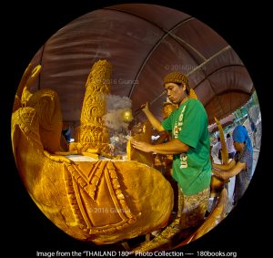 Image of hot wax being poured onto a sculpture