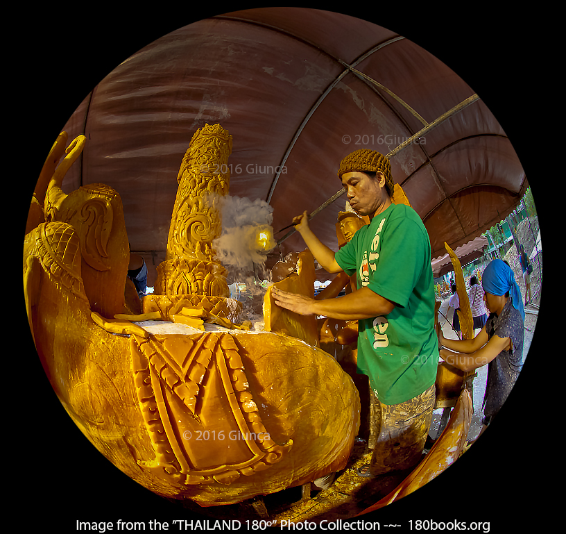 Image of hot wax being poured onto a sculpture