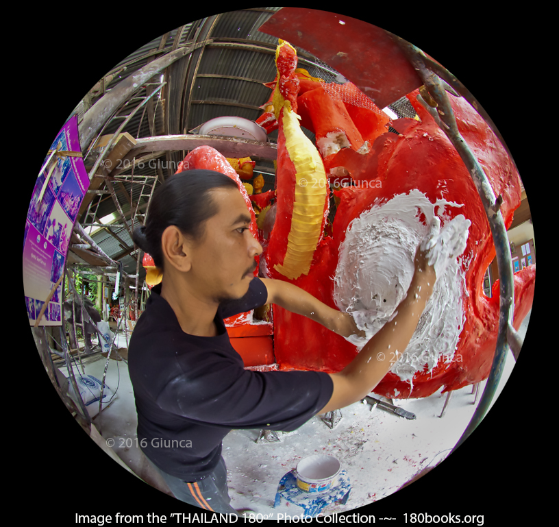 Image of An artisan adds plaster while constructing a float sculpture.