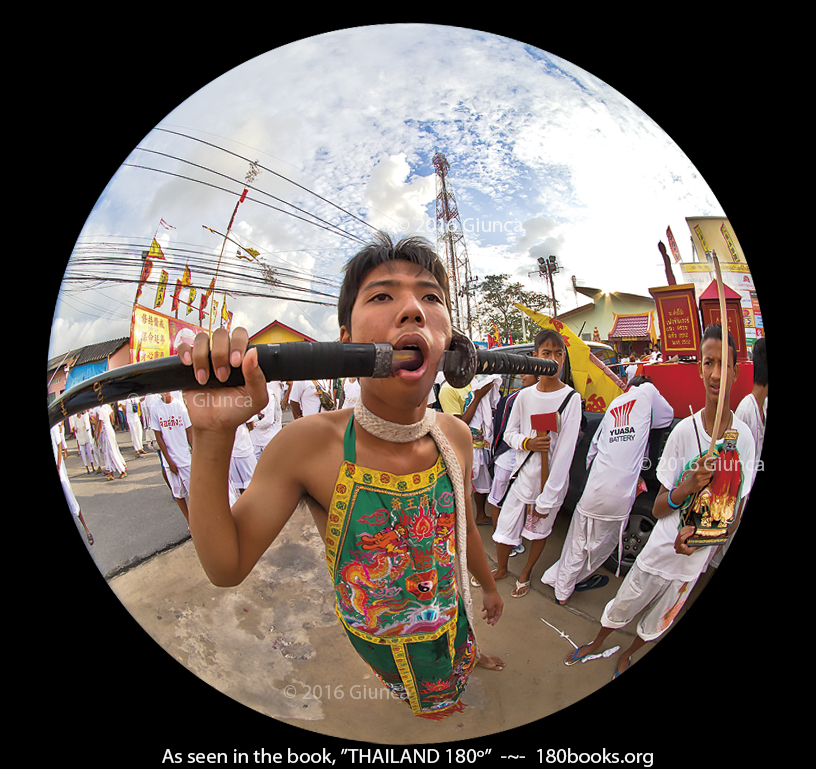 image of Ma Song/man in a Trance at the Phuket Vegetarian Festival, with a Samurai Sword