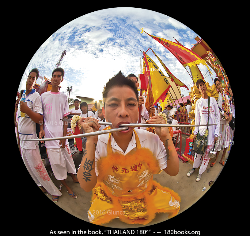 Image of Ma Song/woman in a Trance at the Phuket Vegetarian Festival, with Metal Sticks