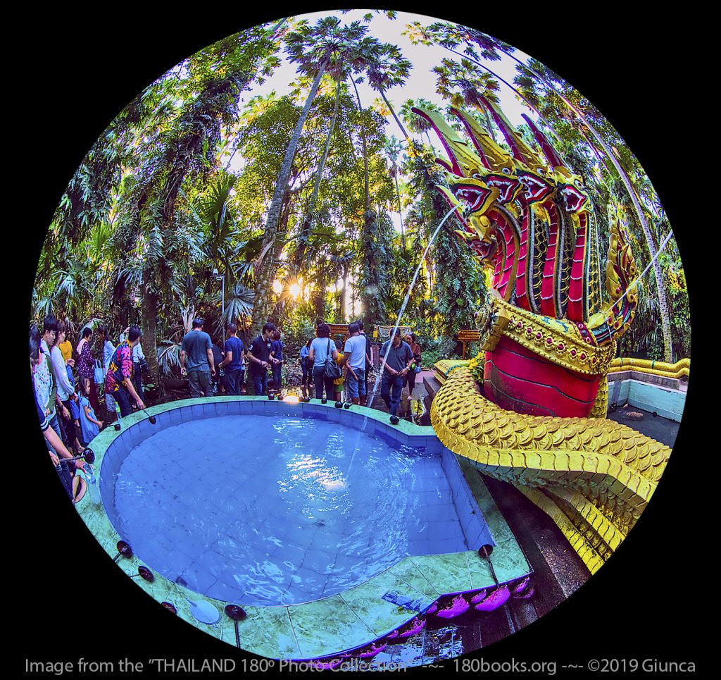 Circular fisheye lens image of Dip a ladle in this fountain of holy water and pour over your head for a blessing.