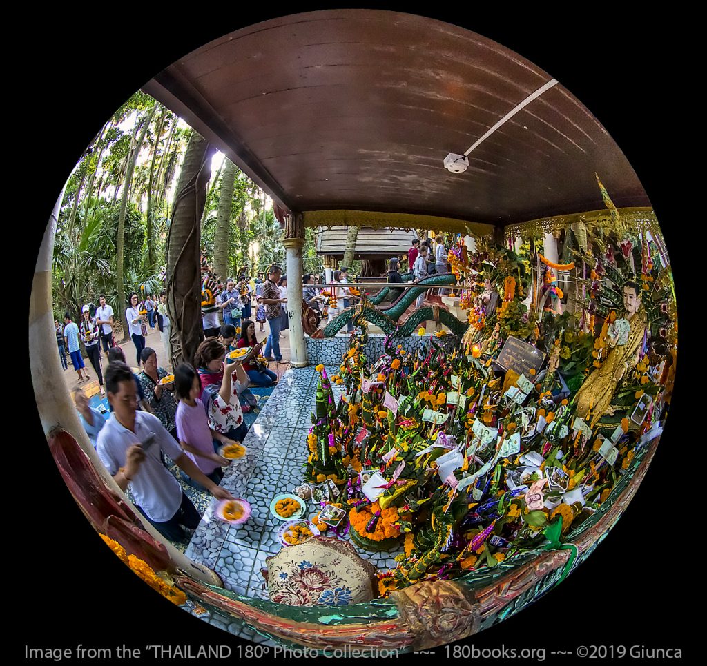 Circular fisheye lens image of Making an offering to Grandpa Naga Pu Si Suttho and Grandma Naga Si Pathumma, who live in the lake at Wat Kham Chanot.